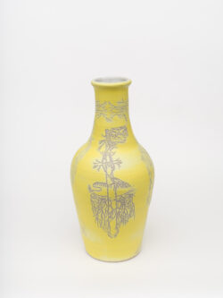 Neural I
2022 A tall, large yellow wheel-thrown ceramic vessel that has a wider round shoulder and comes to a smaller opening at the top, much like a bottle, with a white interior. The surface is carved with diagrams of the nervous system.