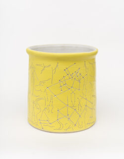 Muscular II
2022 A large yellow wheel-thrown ceramic cylinder with a white interior. The surface is carved with lines that look like constellations or pathways of the body.