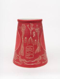 Circulatory II
2022 A large red wheel-thrown ceramic cylinder that is wider at the bottom with a white interior. The surface has been carved with images of lines representing breath and there are two large circles that are a softer red on either side of the vessel.