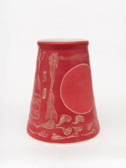Circulatory II
2022 A large red wheel-thrown ceramic cylinder that is wider at the bottom with a white interior. The surface has been carved with images of lines representing breath and there are two large circles that are a softer red on either side of the vessel.