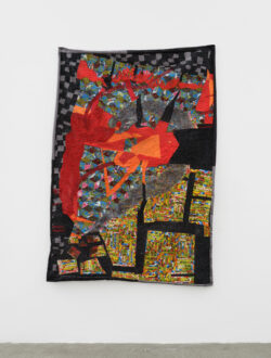 Fire 2022 A dramatic quilt representing a house on fire. There is a flume of smoke that is in the shape of a dragon. There is a green field and everything is being engulfed in flames and smoke. It is hanging on a white wall.