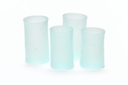 Four icy blue tall and slender blown glass cups